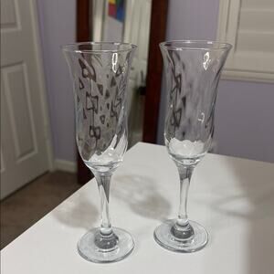 Set of Two clear Stemware with a Textured Cut Crystal Champagne Flutes